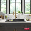 Lavabo de cocina tipo estación de trabajo con un receptáculo de compuesto de granito de 33" de montaje superior encastrado, con reborde WorkFlow™ y accesorios